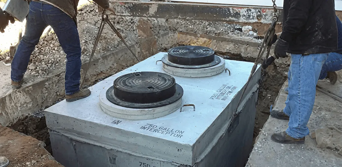 Grease trap installation for a commercial property drainage system in St Paul, MN