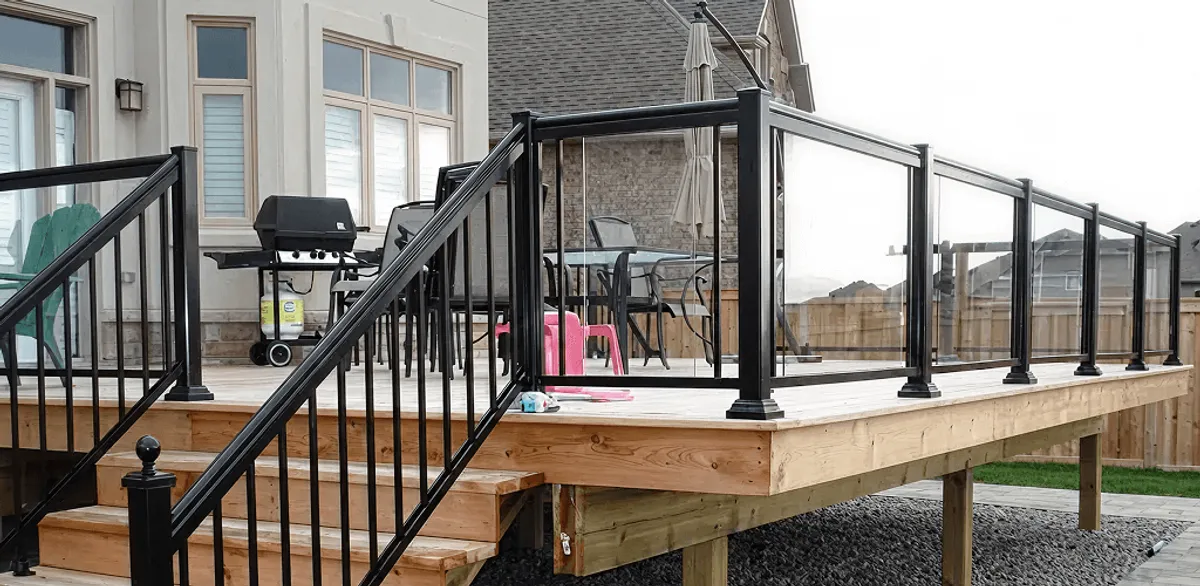 Handrail installation on a deck staircase for safety and code compliance in St Paul, MN
