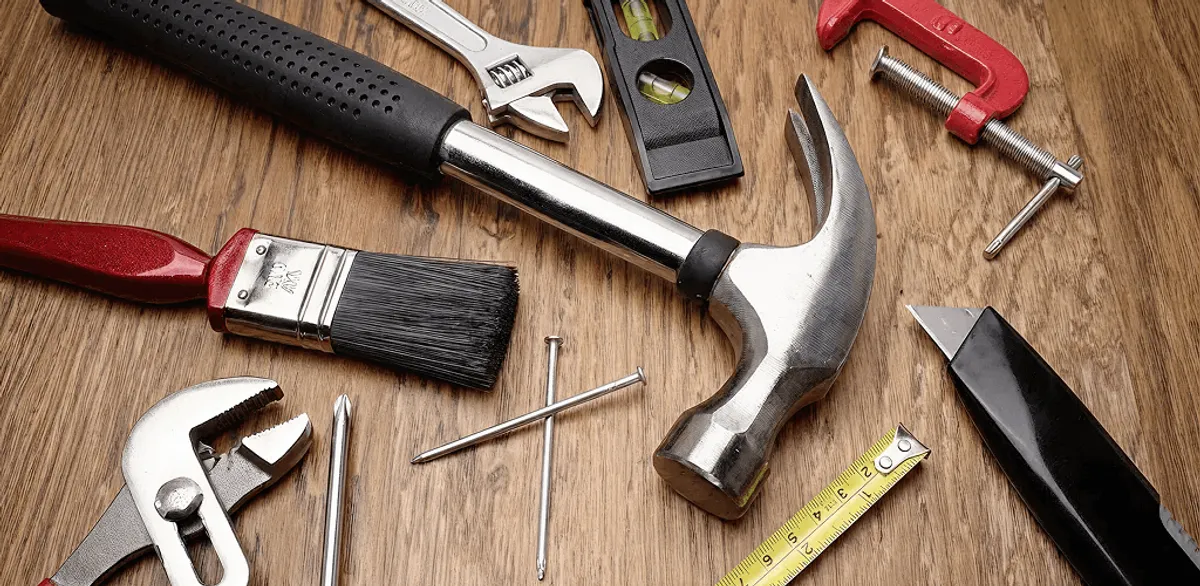 Handyman tools laid out for home repair and maintenance work in St Paul, MN