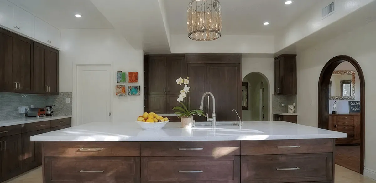 Cabinet refacing project with updated kitchen cabinets and island in St Paul, MN